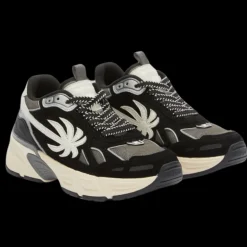 Baskets basses PALM ANGELS cuir noir gris patch palmier blanc