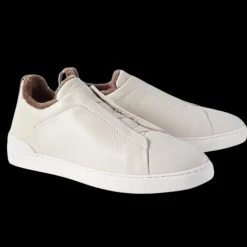 baskets basses ZEGNA Triple Stitch™ cuir grainé crème intérieur shearling