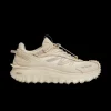 Baskets MONCLER Trailgrip nylon beige semelle crantée Vibram Megagrip