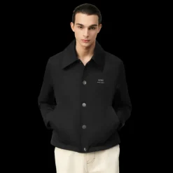 Blouson boutonné AMI Paris toile nylon noir col chemise poche poitrine logo