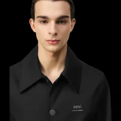 Blouson boutonné AMI Paris toile nylon noir col chemise poche poitrine logo