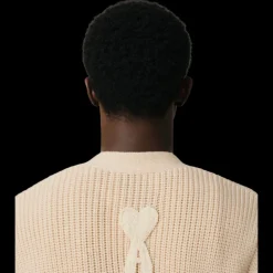 Cardigan AMI Paris laine vierge côtes collège beige bande rouge patch cœur dos