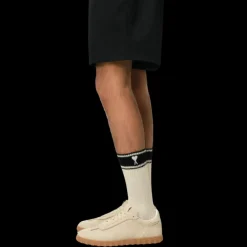 Chaussettes AMI Paris mi mollet coton mélangé bicolore écru noir cœur