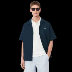 Chemise manche courte LACOSTE coton gaufré bleu marine broderie crocodile