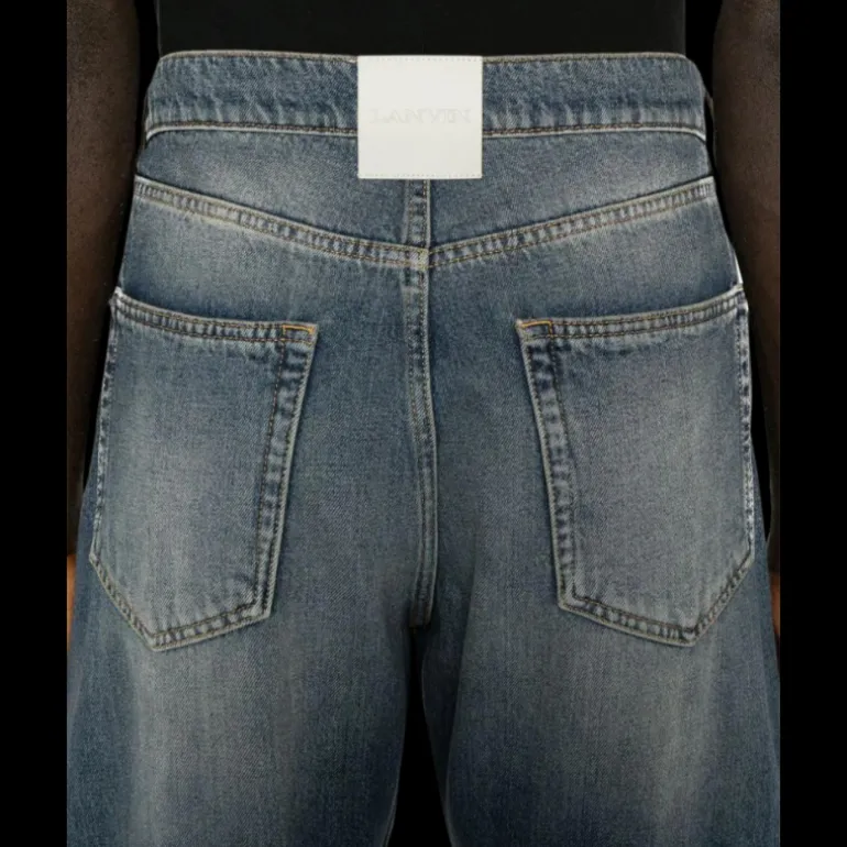 jean droit LANVIN coton denim bleu délavé patch logo cuir blanc dos