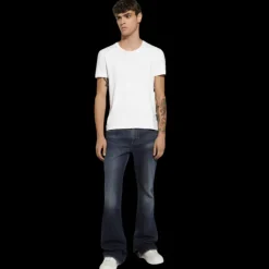 Jean evasé DOLCE & GABBANA coton denim bleu plaque métal