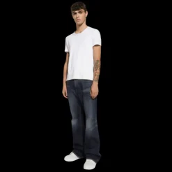 Jean evasé DOLCE & GABBANA coton denim bleu plaque métal