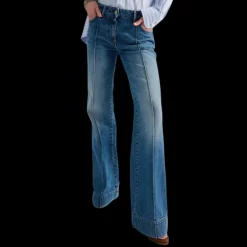 Jean flare BARBARA BUI 5 poches coton denim bleu rivets métal argent