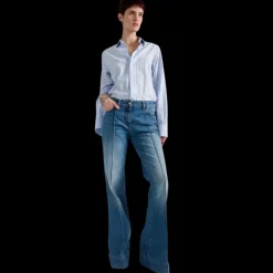 Jean flare BARBARA BUI 5 poches coton denim bleu rivets métal argent
