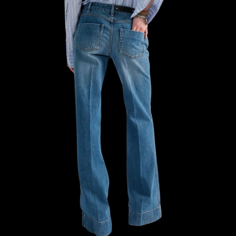 Jean flare BARBARA BUI 5 poches coton denim bleu rivets métal argent