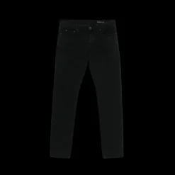Jeans slim SAINT LAURENT coton denim noir délavé plaque cuir noir