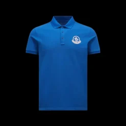 Polo coton piqué MONCLER bleu broderie logo orange