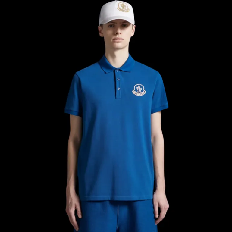 Polo coton piqué MONCLER bleu broderie logo orange
