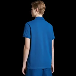 Polo coton piqué MONCLER bleu broderie logo orange