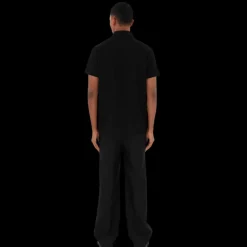 Polo manche courte BURBERRY coton piqué noir cavalier bleu