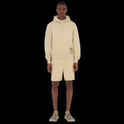 Short ample BURBERRY coton léger beige patch étiquette check beige poche