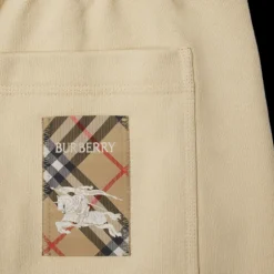 Short ample BURBERRY coton léger beige patch étiquette check beige poche