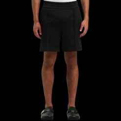 Short de sport PALM ANGELS nylon noir logo incurvé blanc