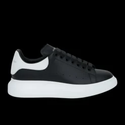 Sneakers ALEXANDER MCQUEEN Oversize cuir noir talon blanc semelle blanche