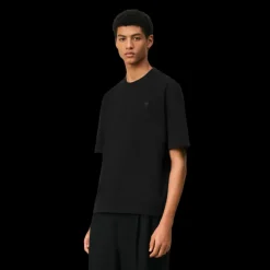 T-shirt AMI Paris col rond jersey de coton bio noir broderie cœur ton sur ton