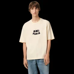 T-shirt AMI Paris col rond jersey de coton bio écru Patch ami maille bleu marine