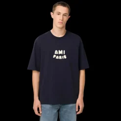 T-shirt AMI Paris ol rond jersey de coton bio bleu marine Patch AMI maille écru
