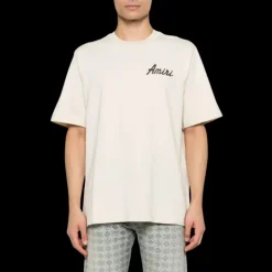 t-shirt col rond AMIRI coton jersey beige imprimé City logo floqué noir