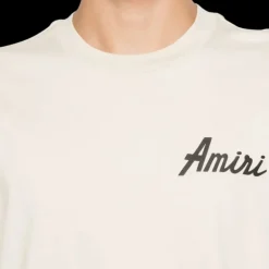 t-shirt col rond AMIRI coton jersey beige imprimé City logo floqué noir