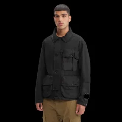 Veste duvet CP COMPANY coton noir DD Shell multipoche lunettes capuche